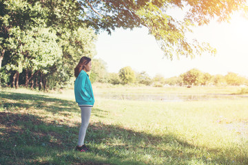 Woman looking away enjoying nature.