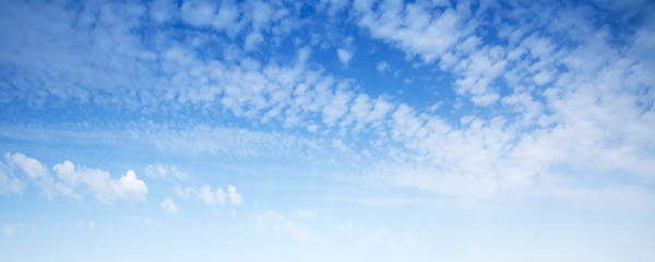 Blue sky with altocumulus clouds, background