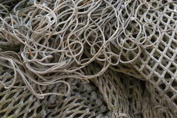 Heap of different old fishing nets