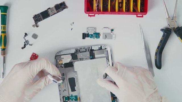Capacitors and power management circuit. The charger and the battery plate. Tablet PC: the device. Repair of the tablet. Working with the chip. The central computer or notebook processor.