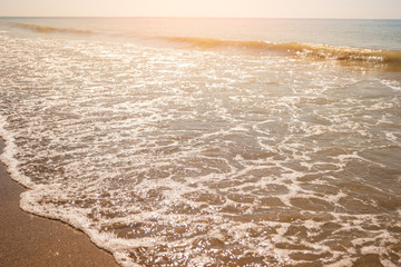 Small wave on the shore. Sea and sunshine. Place for summer rest. Far from problems and bustle.