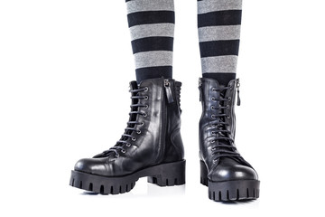 Black leather boots isolated on white background