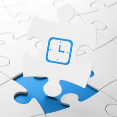 Time concept: Watch on puzzle background
