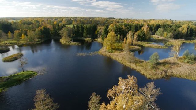 Colorful autumn landscape with lake.Nature background. Lithuania Birzai
