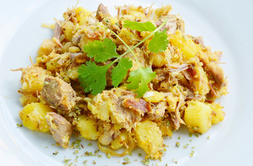 European food with potato and some mea,egg and onion
