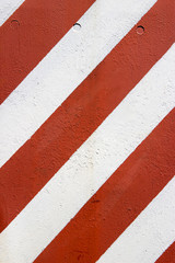 Fototapeta premium Red and white road marking