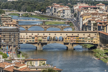 Florence, Italy- August 12, 2016: Cityscape of the city of Florence with the Ponte Vecchio overlooking the Arno River in Florence, Italy