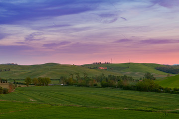 Typical Tuscany landscape springtime at sunset in Italy