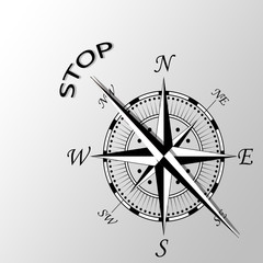 Illustration of stop word written aside compass