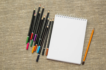 colored pencils on burlap