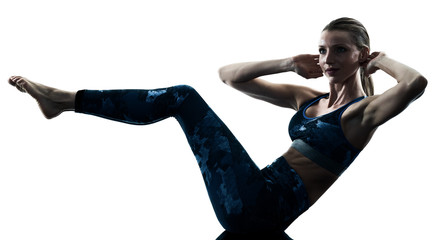 Obraz premium woman fitness pilates excercises silhouette 