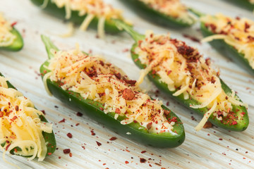 Cooking fried jalapeno poppers with cheese