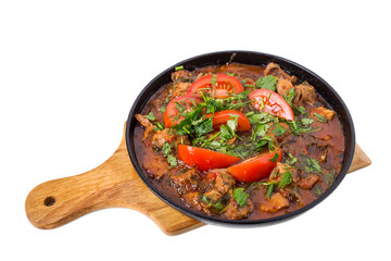 Delicious stewed pork fillet with fresh tomatoes.