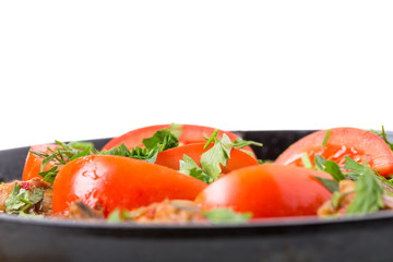 Delicious stewed pork fillet with fresh tomatoes.