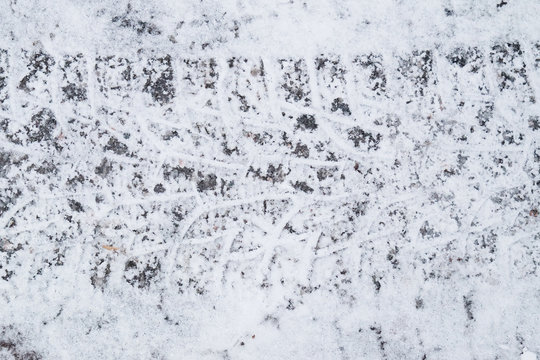 tire tracks on the frozen snow closeup