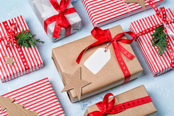 Christmas gift boxes and decorations, stone table, close up
