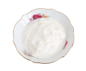 Fresh sour cream in bowl.