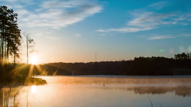 Lake Crabtree Fog Moving into Golden Morning Sun Rays in Raleigh NC Nature Scene