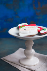 Christmas gingerbread cookies decorated with fondant Elf face. Cute festive image with copy space.