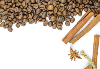 Coffee beans and spices on a white background