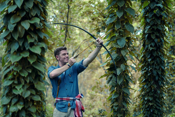 beautiful young  men archers practicing archery