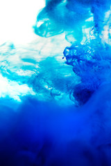 Fototapeta na wymiar blue dye in water