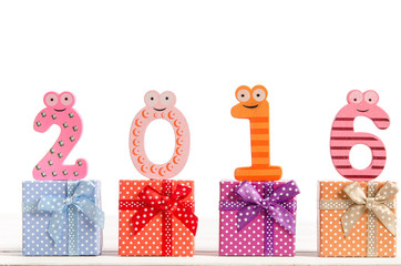 composition from numbers 2016 and gift boxes