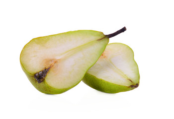 Green pear cut isolated on white background.