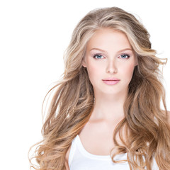 Beautiful happy woman with long curly hair.