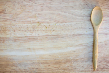 wooden spoon on wooden board for texture
