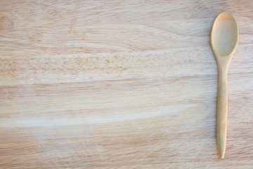 wooden spoon on wooden board for texture