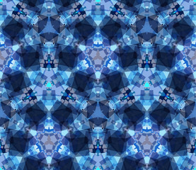 Blue kaleidoscope seamless pattern. Composed of color abstract shapes. Useful as design element for texture and artistic compositions.