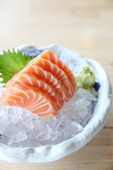 salmon sashimi on wood background , Japanese food