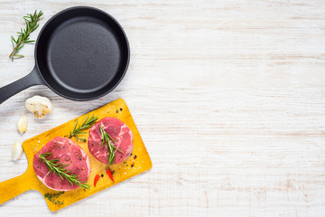 Frying Pan and Raw meat on Copy Space Area