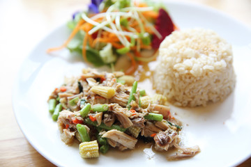Stir fried chicken and basil served with rice