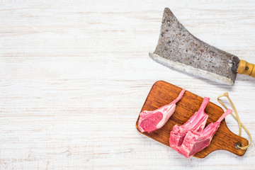 Meat Cleaver with Lamb Chops on Copy Space