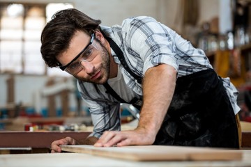 Carpenter working on his craft