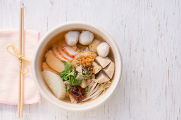 Thai Noodle , Thai Noodle meat.,Bowl of noodles with vegetables on wooden table.