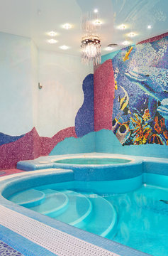Luxury swimming pool with mosaic tile