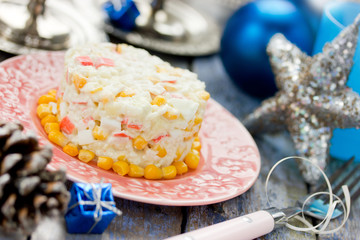 Christmas or New Year appetizer - crab salad with corn egg rice