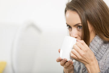 Young woman enjoying coffee