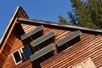 Solar panel on a wooden house
