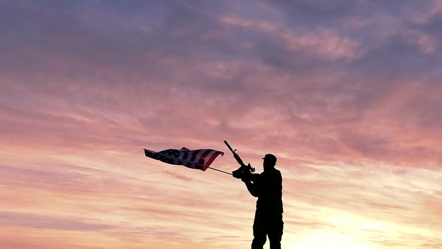 
Soldier silhouette and American Flag with automatic rifle. Slow Motion. 

