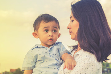 Happy family time of mom and son, family outdoor activity