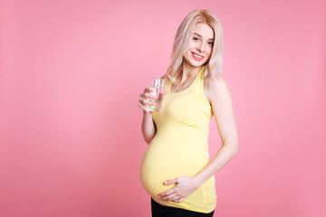 Pregnant woman caressing her belly