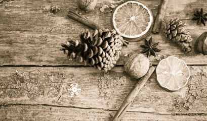 Winter composition with pine cones and spices