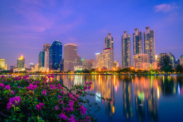 Fototapeta na wymiar Cityscape image of Benchakitti Park at night sky in Bangkok, Thailand