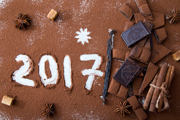 Christmas composition. Chocolate, cacao, cinnamon and vanilla st