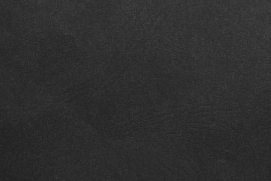 Paper texture - black kraft sheet background.