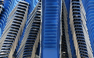 blue chairs stacked horizontal
